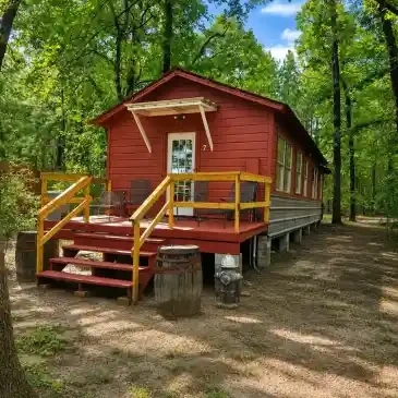 Fire House Lodge exterior — red building with yellow railings