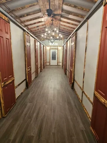 D-Ranch Lodge hallway with red doors